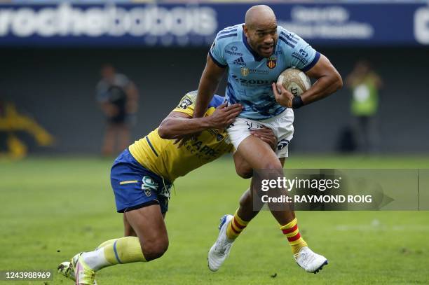 Perpignan's Australian centre Afusipa Taumoepeau holds the ball during the French Top14 rugby union match between USA Perpignan and ASM Clermont...