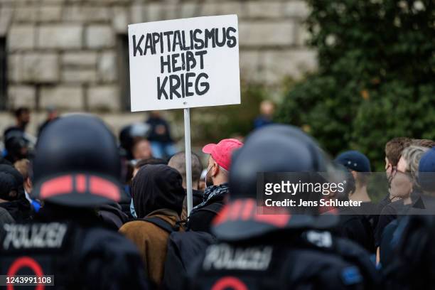 People march to protest against skyrocketing energy prices and the growing cost of living on October 15, 2022 in Leipzig, Germany. The protest,...