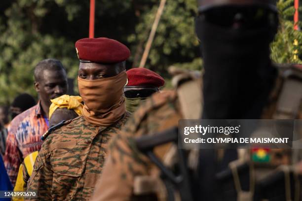 Captain Ibrahim Traore, Burkina Faso's new president, leaves the ceremony for the 35th anniversary of Thomas Sankaras assassination, in Ouagadougou,...