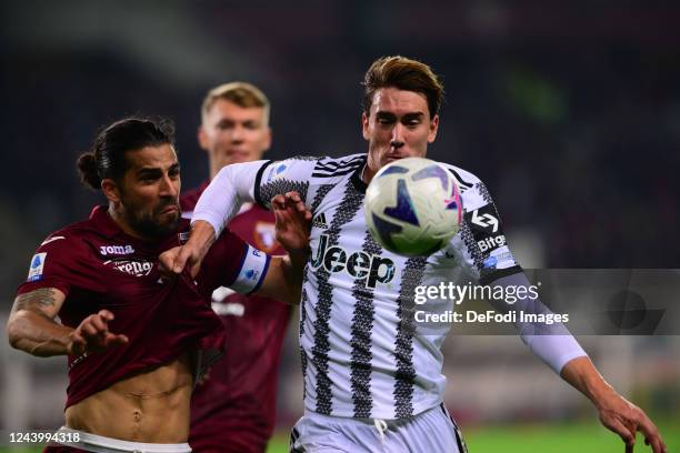 Ricardo Rodriguez of Torino FC and Dusan Vlahovic of Juventus FC battle for the ball during FC Turin-Juventus Turin, 10th round of Serie A Tim...