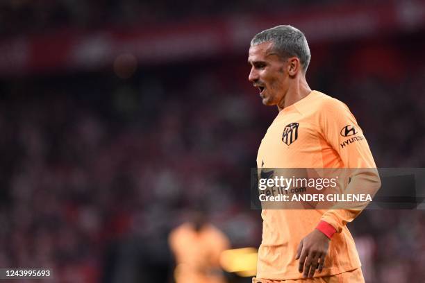 Atletico Madrid's French forward Antoine Griezmann celebrates scoring his team's first goal during the Spanish League football match between Athletic...