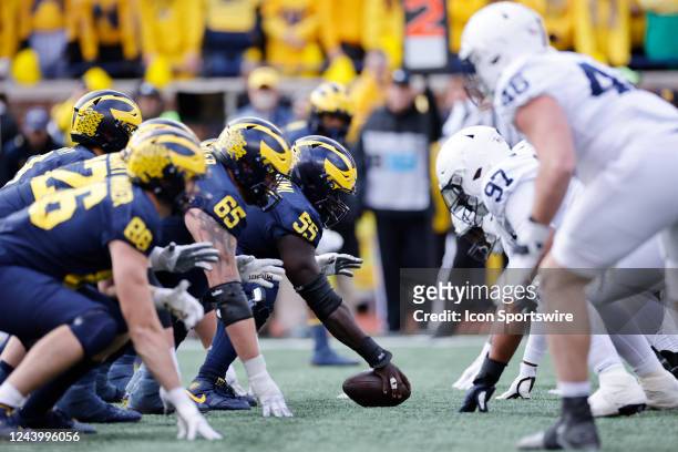 Michigan Wolverines face off at the line of scrimmage against the Penn State Nittany Lions during a college football game on October 15, 2022 at...