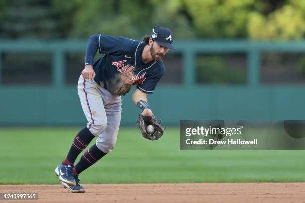Dansby Swanson of the Atlanta Braves fields a ground ball in the eighth inning during the game between the Atlanta Braves and the Philadelphia...
