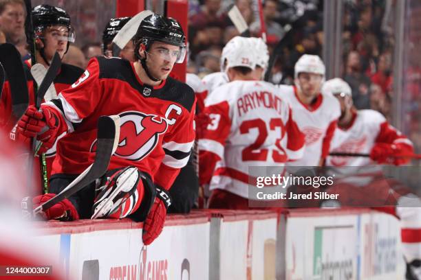 Nico Hischier of the New Jersey Devils looks to make a line change against the Detroit Red Wings at the Prudential Center during the home opener on...