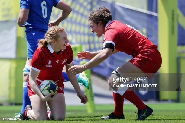 Canada's Paige Farries celebrates scoring a try during the New Zealand 2021 Women's Rugby World Cup Pool A match between Canada and Italy at...