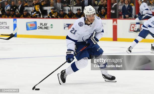 Brayden Point of the Tampa Bay Lightning attempts a shot in the second period during the game against the Pittsburgh Penguins at PPG PAINTS Arena on...