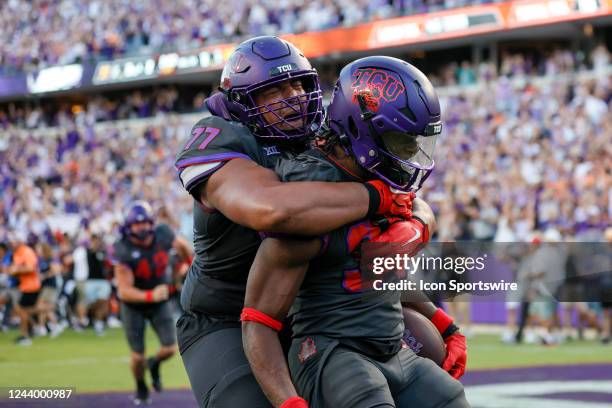 Horned Frogs running back Kendre Miller gets a big hug from offensive tackle Brandon Coleman after scoring the game winning touchdown in the 2nd...