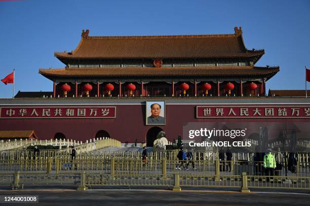 General view shows the portrait of late Communist leader Mao Zedong at Tiananmen Gate in Beijing on October 16 ahead of the opening session of the...