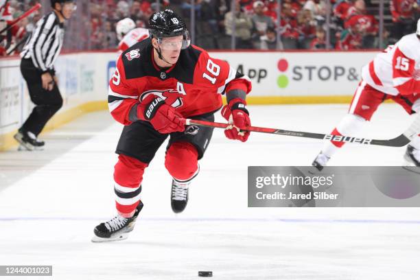 Ondrej Palat of the New Jersey Devils skates with the puck against the Detroit Red Wings at the Prudential Center during the home opener on October...