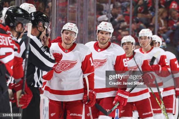 Jakub Vrana of the Detroit Red Wings celebrates with teammates after scoring a goal in the second period against the New Jersey Devils at the...