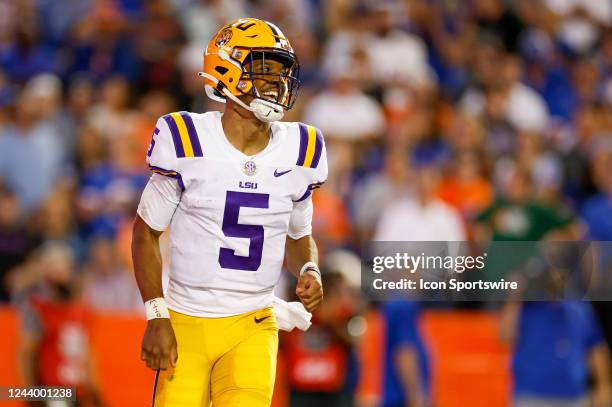 Tigers quarterback Jayden Daniels celebrates a touchdown during the game between the LSU Tigers and the Florida Gators on October 15, 2022 at Ben...