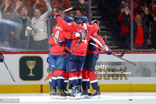 The Washington Capitals celebrate a goal against the Montreal Canadiens at Capital One Arena on October 15, 2022 in Washington, D.C.