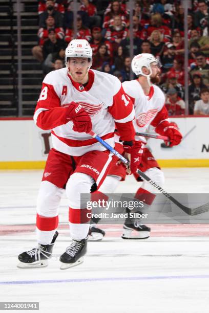 Andrew Copp of the Detroit Red Wings skates against the New Jersey Devils at the Prudential Center on October 15, 2022 in Newark, New Jersey.