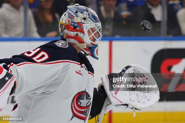 Elvis Merzlikins of the Columbus Blue Jackets makes a save against the St. Louis Blues in the third period at Enterprise Center on October 15, 2022...