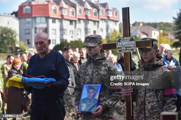 Soldiers and relatives attend a funeral ceremony of Ihor Gadyak, Yuriy Lelyavskyi, and Roman Vyshinskyi, Ukrainian soldiers at the Lychakiv Cemetery...