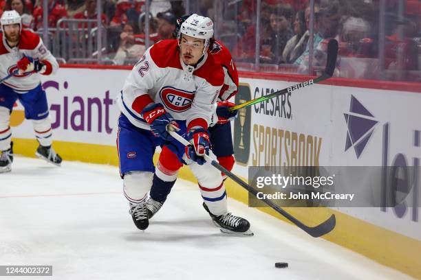 Arber Xhekaj of the Montreal Canadiens looks to make a pass during a game against the Washington Capitals at Capital One Arena on October 15, 2022 in...