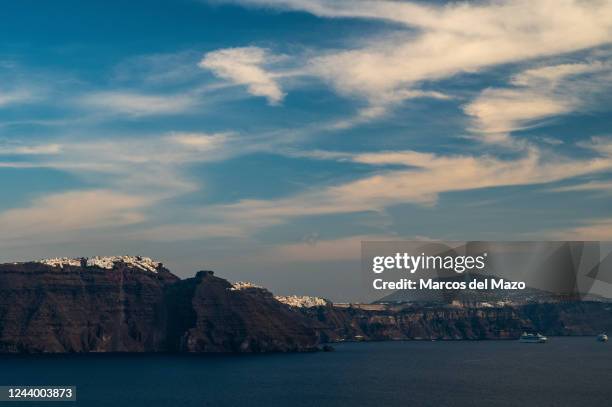 View of the coast with the towns above the cliffs of Santorini. Santorini is one of the Cyclades islands in the Aegean Sea known for the traditional...