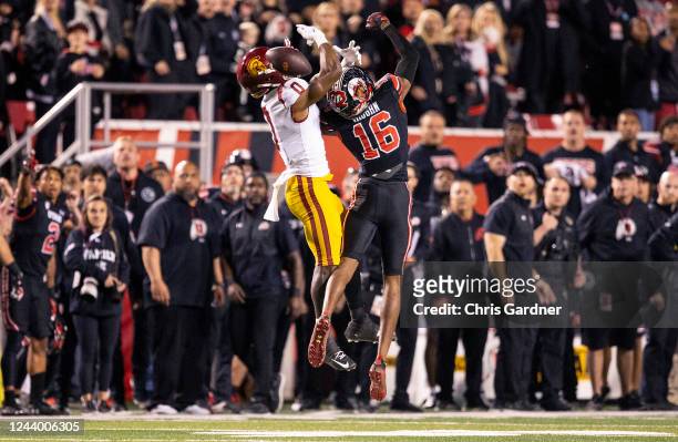 Zemaiah Vaughn of the Utah Utes breaks up a pass play to Terrell Bynum of the USC Trojans during the second half of their game October 15, 2022...