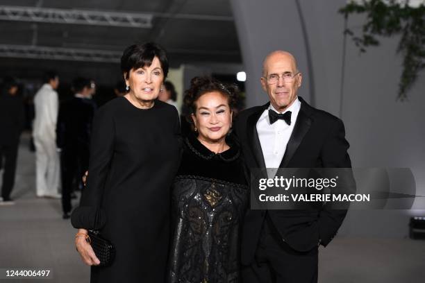 South Korean producer Miky Lee poses with producer Jeffrey Katzenberg and Marilyn Katzenberg as they arrive for the 2nd Annual Academy Museum Gala at...