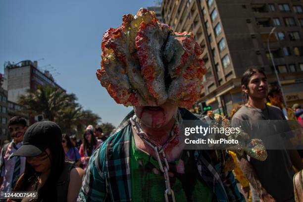 Person wears a zombie costume from the game The last of us. After three years of absence, zombies and horrible creatures once again marched through...