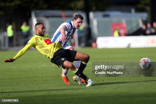 Harrogate Town's Kayne Ramsay in action with Hartlepool United's Callum Cooke during the Sky Bet League 2 match between Harrogate Town and Hartlepool...