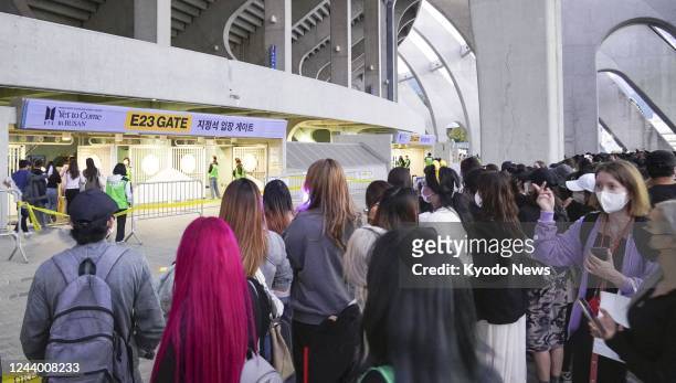 Fans of South Korean boy band BTS gather at Busan Asiad Main Stadium for a free concert by the group on Oct. 15, 2022.