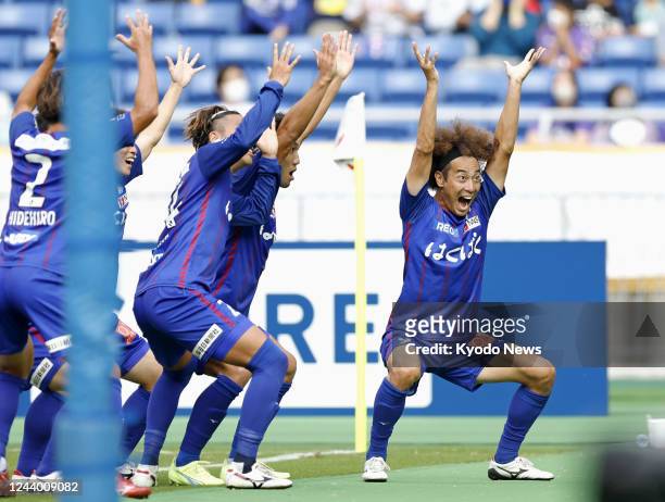Ventforet Kofu players celebrate after Kazushi Mitsuhira opened the scoring in the first half of the Emperor's Cup football final against Sanfrecce...