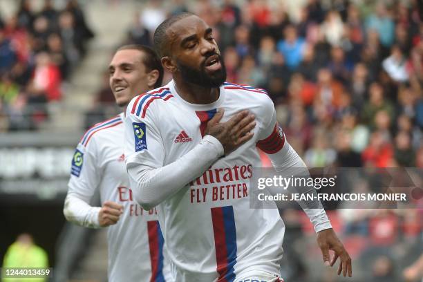 Lyon's French forward Alexandre Lacazette celebrates scoring his team's first goal during the French L1 football match between Stade Rennais FC and...