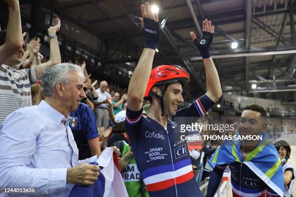 France's Benjamin Thomas and France's Donavan Grondin celebrate winning the Men's Madison 50km final during the UCI Track Cycling World Championships...