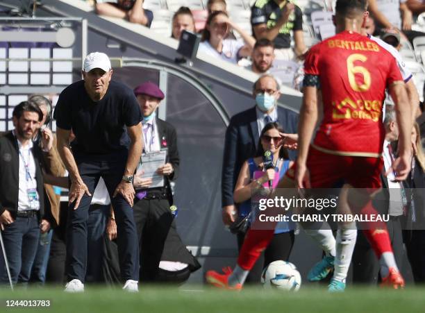 Toulouse's French head coach Philippe Montanier looks at his players during the French L1 football match between Toulouse FC and SCO Angers at...