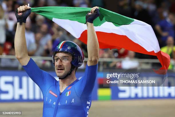 Italy's Elia Viviani celebrates winning the Men's Elimination finals during the UCI Track Cycling World Championships at the Velodrome of...