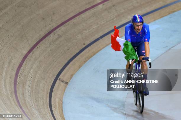 Italy's Elia Viviani celebrates winning the Men's Elimination finals during the UCI Track Cycling World Championships at the Velodrome of...