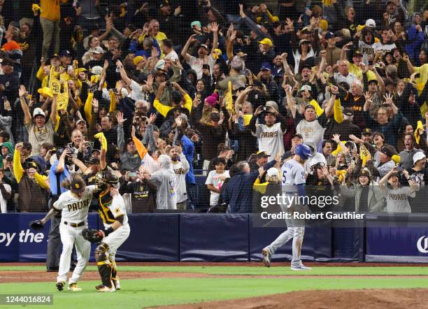 San Diego, CA, Saturday, October 15, 2022 - San Diego Padres relief pitcher Josh Hader celebrates with Austin Nola as Los Angeles Dodgers Freddie...