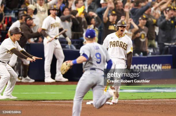 San Diego, CA, Saturday, October 15, 2022 - San Diego Padres right fielder Juan Soto hits s game-tying single in the 7th inning.The LA Dodgers and...