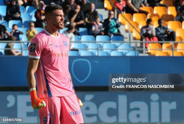 Troyes' Polish goalkeeper Mateusz Lis reacts during the French L1 football match between ES Troyes AC and AC Ajaccio at the Aube Stadium in Troyes,...