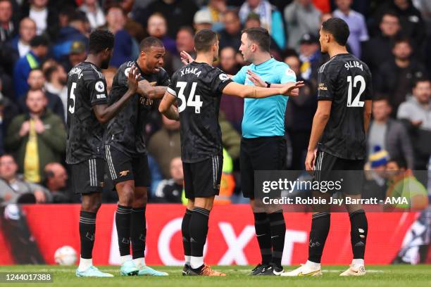 Gabriel of Arsenal reacts after receiving a red card which is overturned by VAR during the Premier League match between Leeds United and Arsenal FC...