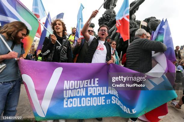 Protesters march from Nation towards Place de la Bastille during a rally against soaring living costs and climate inaction called by French left-wing...