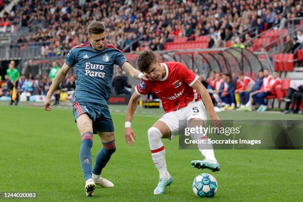 Sebastian Szymanski of Feyenoord, Milos Kerkez of AZ Alkmaar during the Dutch Eredivisie match between AZ Alkmaar v Feyenoord at the AFAS Stadium on...