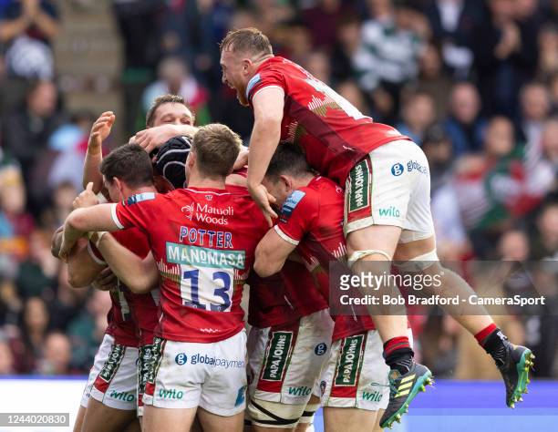 Leicester celebrate scoring a try during the Gallagher Premiership Rugby match between Harlequins and Leicester Tigers at Twickenham Stadium on...
