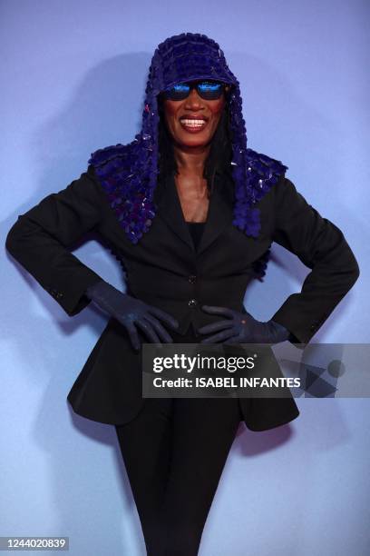 Jamaican singer and model Grace Jones poses on the red carpet on arrival to attend the Closing Night Gala European Premiere of the "Glass Onion: a...