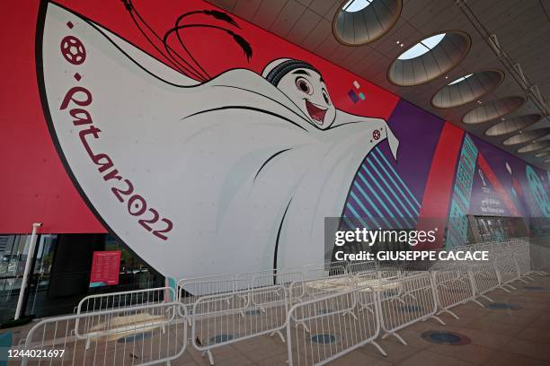 Picture shows a view of the main ticket centre for Qatar's FIFA football World Cup, with a mural of its mascot "La'eeb", in the capital Doha on...