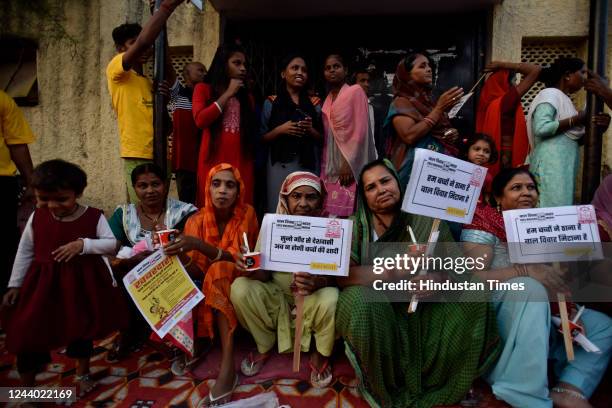 Women along with children at child marriage awareness campaign, in slum area of Vasant Vihar, on October 16, 2022 in New Delhi, India.