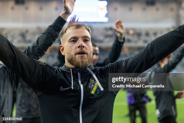 AIKs John Guidetti celebrates AIKs victory during an Allsvenskan match between Djurgardens IF and AIK at Tele2 Arena on October 16, 2022 in...