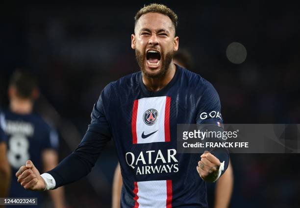 Paris Saint-Germain's Brazilian forward Neymar celebrates after opening the scoring during the French L1 football match between Paris Saint-Germain...