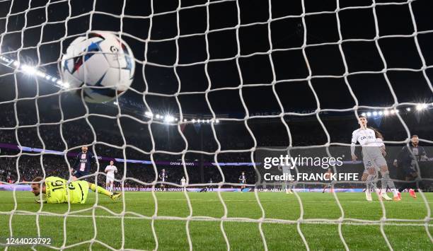 Paris Saint-Germain's Brazilian forward Neymar celebrates after opening the scoring against Marseille's Spanish goalkeeper Pau Lopez during the...