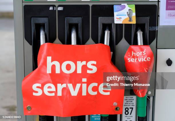 Sign with 'hors sevice' on the nuzzles of a total Energie gaz station on october 16, 2022 in Le Chesnay, France. On Saturday, October 15, a quarter...