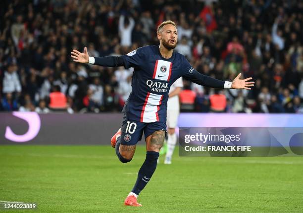 Paris Saint-Germain's Brazilian forward Neymar celebrates after opening the scoring during the French L1 football match between Paris Saint-Germain...