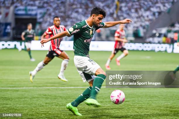 Jose Lopez of Palmeiras attempts a kick during the match between Palmeiras and São Paulo at Allianz Parque on October 16, 2022 in Sao Paulo, Brazil.