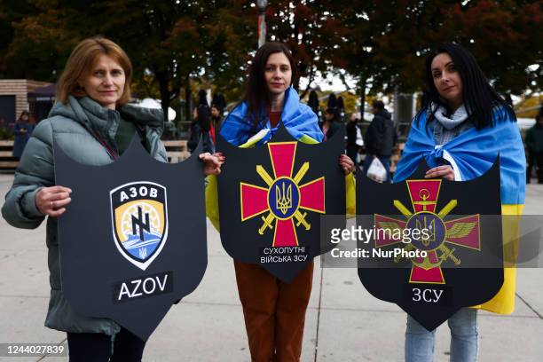 Members of Ukrainian diaspora attend a demonstration of solidarity with Ukraine. Chicago, United States, on October 16, 2022.