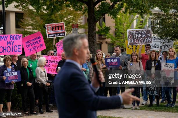 Commissioner Bob Harvie speaks as abortion rights activists protest during a "Bans Off Our Bodies" rally at Old Bucks County Courthouse in...